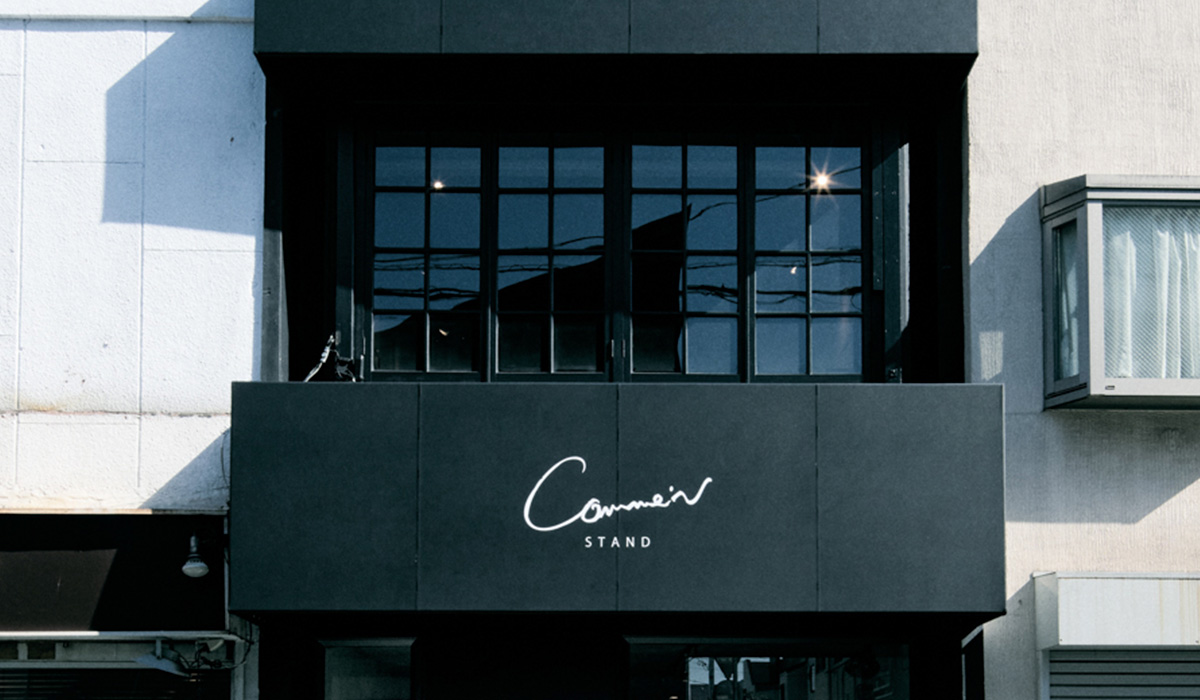 Comme'N STAND